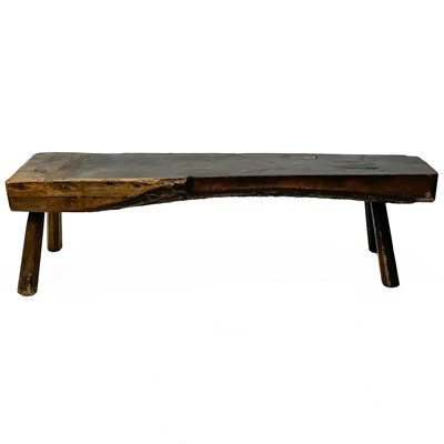 Lot 24 - An elm low cobblers bench.
