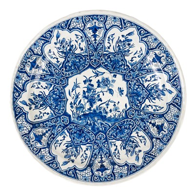 Lot 52 - A French faience tin-glaze blue and white charger.