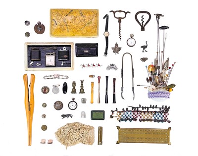 Lot 84 - A collection of various hatpins.