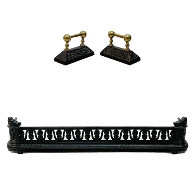 Lot 60 - A late Victorian cast iron pierced fender.