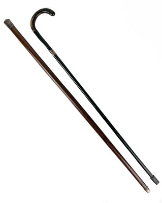 Lot 110 - A silver top tropical hardwood walking cane.