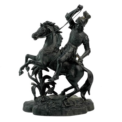 Lot 46 - A spelter sculpture of a knight on horseback.