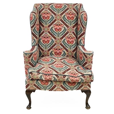 Lot 729 - A George III style wing back tapestry armchair.
