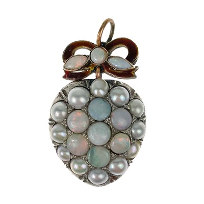Lot 77 - A Victorian gold white opal and split pearl heart and red enamel bow pendant.