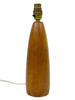Lot 37 - A mid century teak turned table lamp.