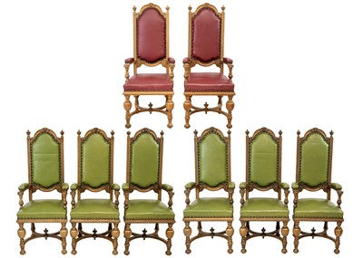 Lot 18 - A set of eight carved oak elbow chairs.