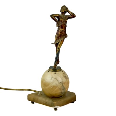 Lot 54 - An art deco figural lamp base.