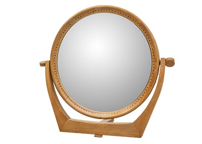 Lot 476 - A mid century walnut inlaid circular dressing table mirror.