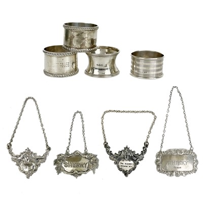 Lot 23 - Four hallmarked silver napkin rings