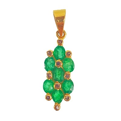 Lot 84 - An 18ct emerald and diamond set pendant.