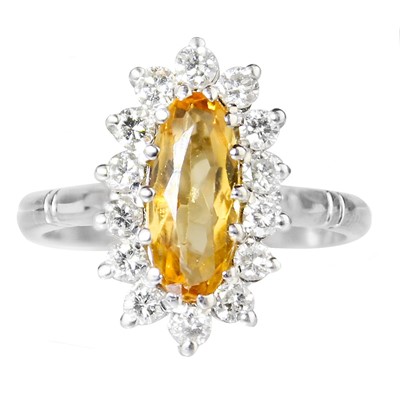 Lot 55 - An 18ct white gold Imperial Topaz and diamond set cluster ring.