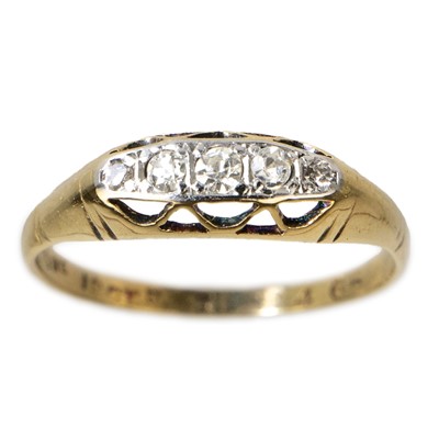 Lot 71 - An 18ct gold and platinum diamond ring.