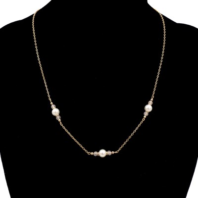 Lot 45 - Two cultured pearl necklaces, one with an amber drop.