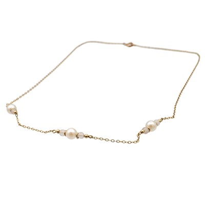 Lot 45 - Two cultured pearl necklaces, one with an amber drop.