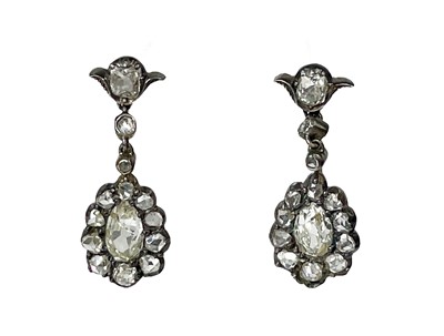 Lot 42 - A pair of 19th century silver diamond set pendant earrings.