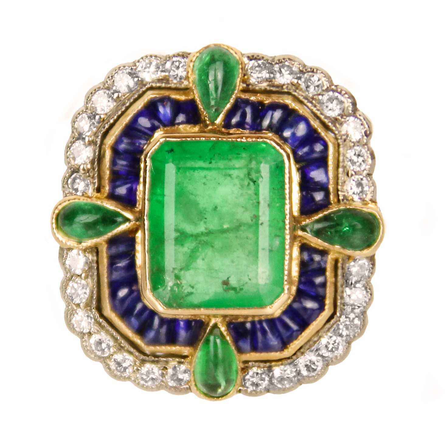 Lot 286 - An attractive 18ct diamond, emerald and sapphire set dress ring.