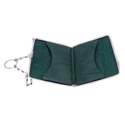 Lot 39 - A George V silver purse with chain.