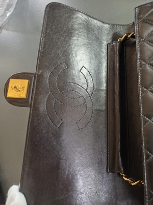 Lot 388 - A Chanel black quilted lambskin single flap wallet shoulder bag.