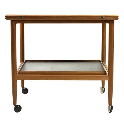 Lot 12 - A mid century teak swivel fold over trolley probably by Arrebo Møblor