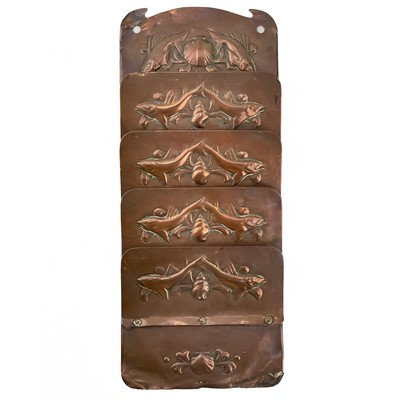 Lot 14 - A Newlyn copper four section hanging letter rack.