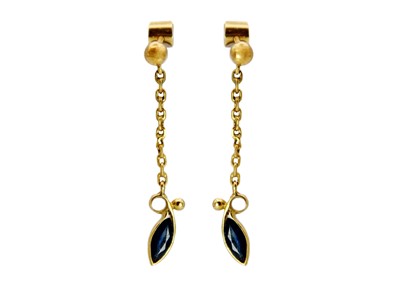 Lot 169 - A pair of contemporary, high-purity gold blue sapphire set pendant stud earrings.
