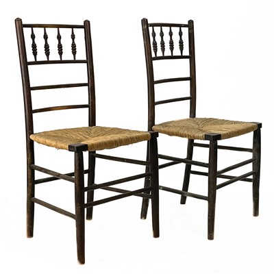 Lot 27 - A pair of spindle back rush seat chairs.