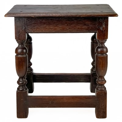 Lot 12 - An oak joint stool.