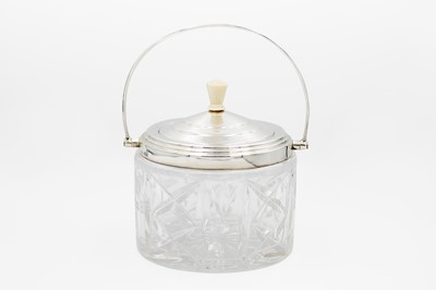 Lot 133 - A George VI Art Deco silver mounted cut glass biscuit barrel by C W Fletcher.