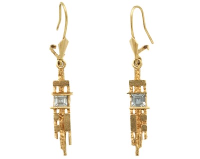 Lot 25 - A 14ct and aquamarine set pair of Modernist pendant earrings.