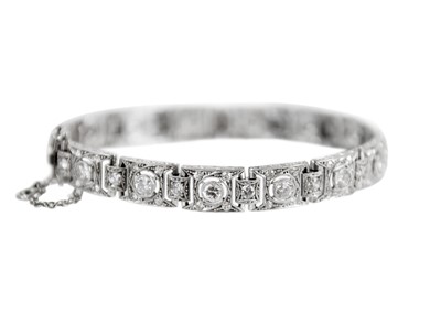 Lot 98 - A platinum and diamond bracelet, circa 1920's.