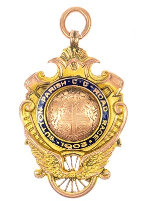 Lot 77 - An Edwardian 15ct rose gold and enamel shield watch chain fob.