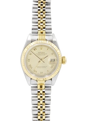 Lot 132 - ROLEX - A Rolex Oyster Perpetual Datejust lady's gold and stainless steel bracelet wristwatch.