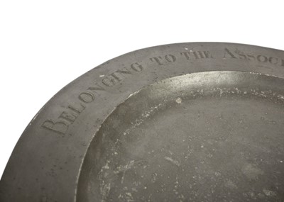 Lot 1016 - A large 18th century pewter charger.