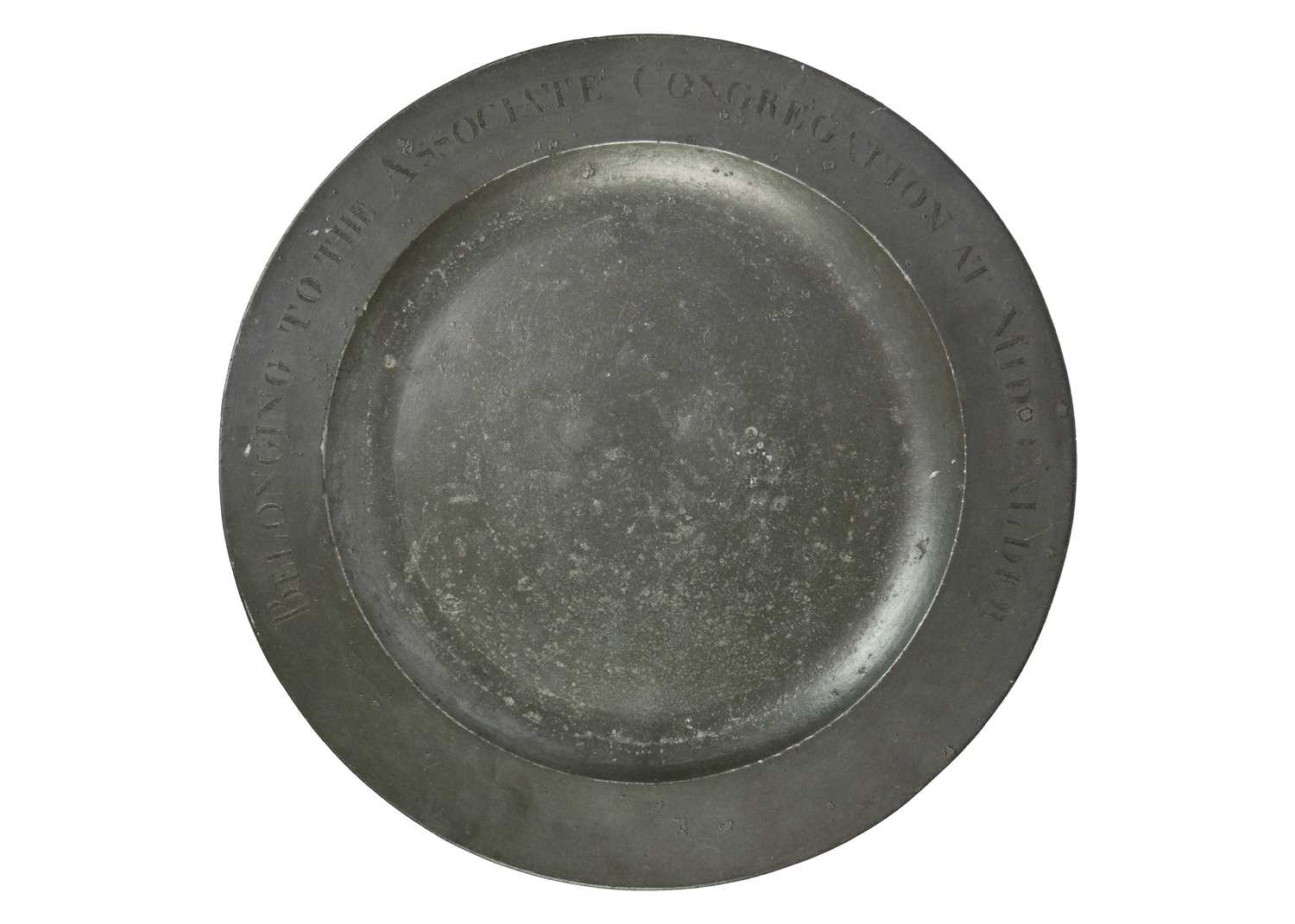 Lot 1016 - A large 18th century pewter charger.