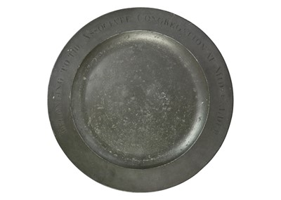 Lot 1016 - A large 18th century pewter charger.