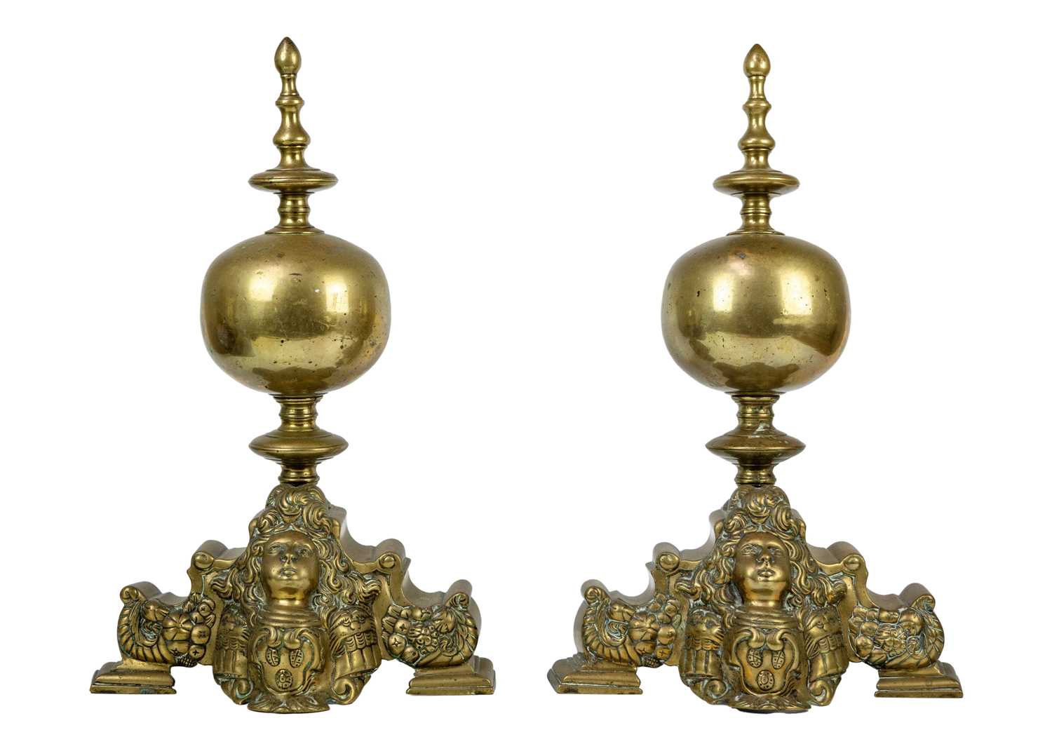Lot 1017 - A pair of Dutch brass andirons.