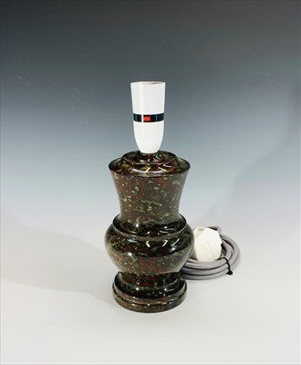 Lot 23 - A Cornish serpentine table lamp. Height 26cm...