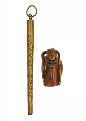 Lot 1039 - A Japanese carved boxwood netsuke, signed, late Meiji period.