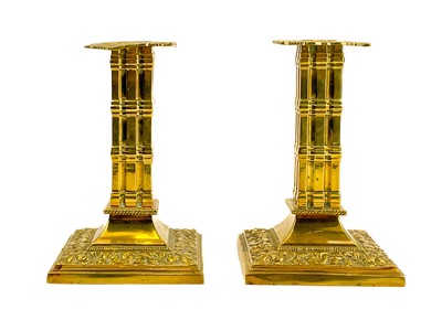 Lot 152 - A pair of Victorian brass candlesticks by William Tonks & Sons.