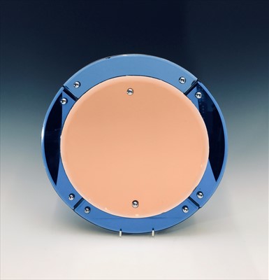 Lot 15 - An Art Deco period circular copper toned wall...