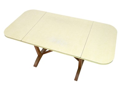 Lot 19 - A David Joel formica topped oak drop leaf table.
