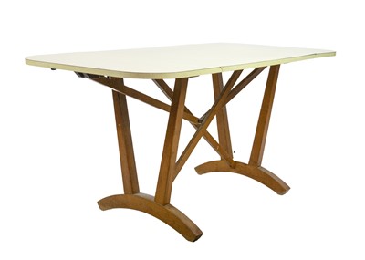 Lot 19 - A David Joel formica topped oak drop leaf table.