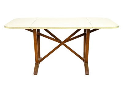 Lot 19 - A David Joel formica topped oak drop leaf table.