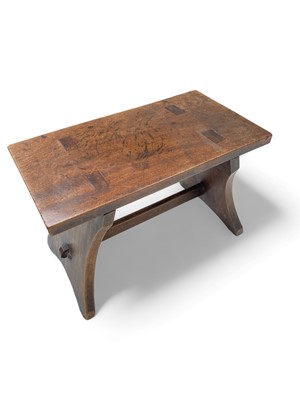 Lot 1028 - A 19th century fruitwood stool.