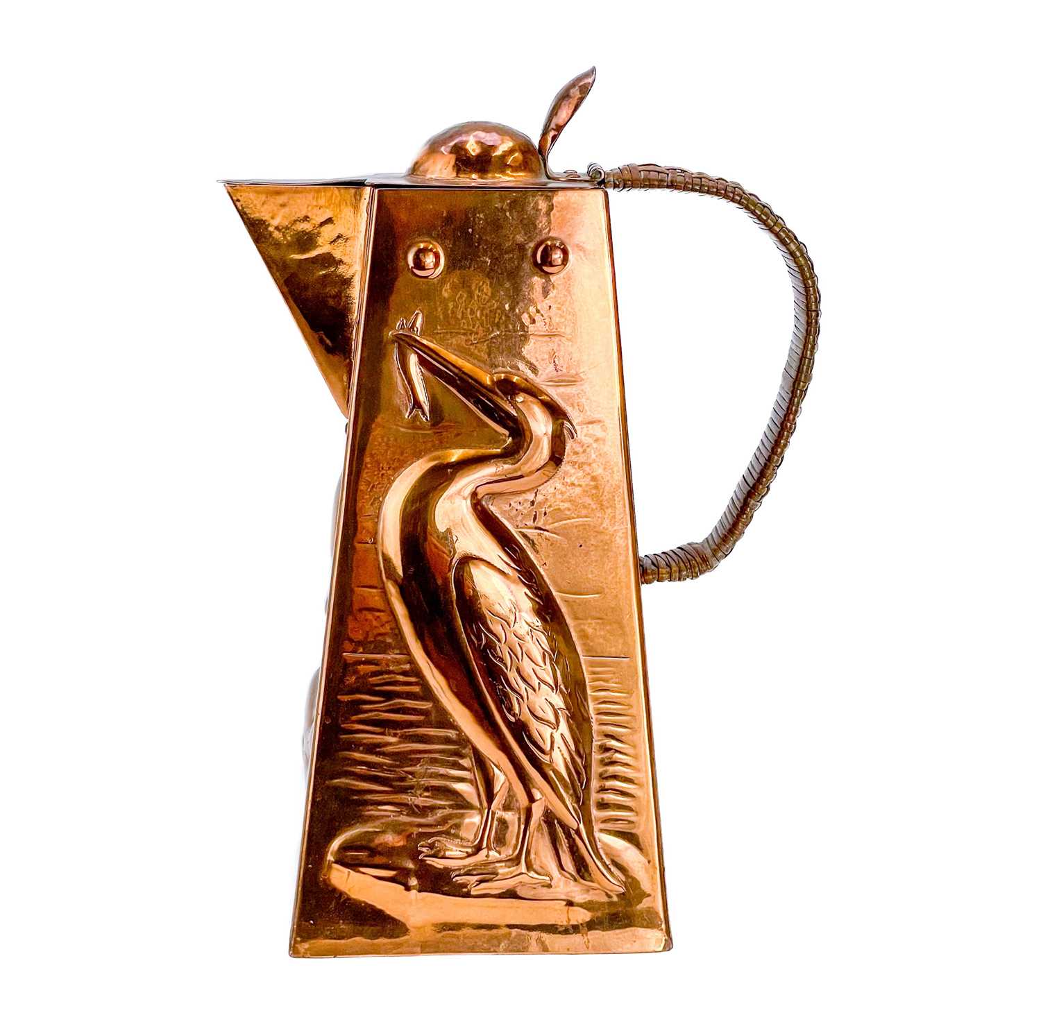Lot 9 - A Newlyn copper hot water jug.