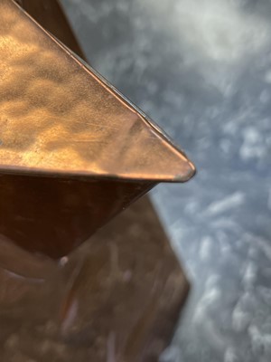 Lot 9 - A Newlyn copper hot water jug.