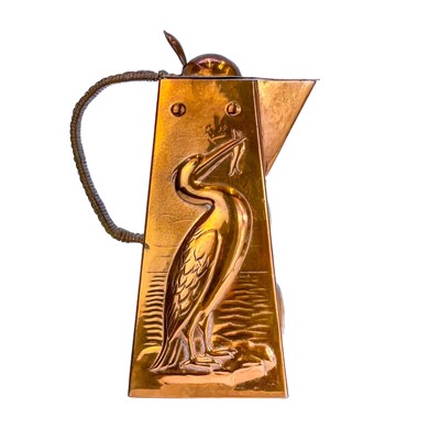 Lot 9 - A Newlyn copper hot water jug.