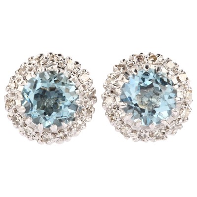 Lot 276 - A pair of 18ct white gold (tested) aquamarine and diamond cluster stud earrings.