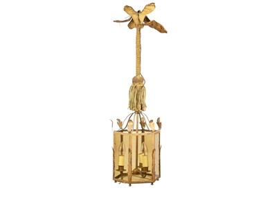 Lot 83 - A wrought iron and smoked glass octagonal hall lantern.