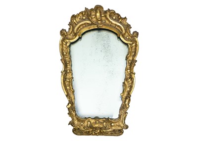 Lot 58 - An 18th century baroque wood carved gesso gilt mirror.